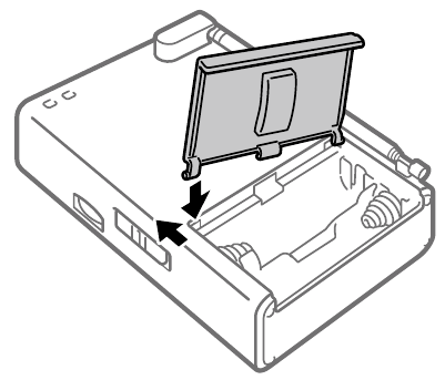 La tapa de la bater&iacute;a se desprende - Instrucciones