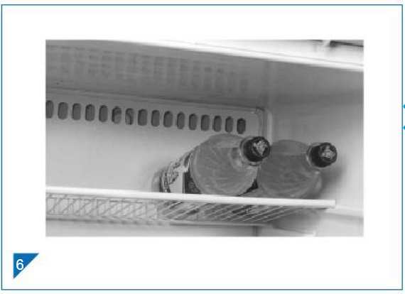 Uso del compartimento de refrigeraci&oacute;n y los accesorios - Paso 1