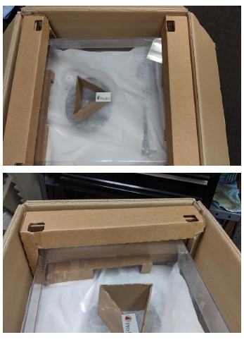 Colocaci&oacute;n de la cubierta antipolvo en la caja - Paso 1